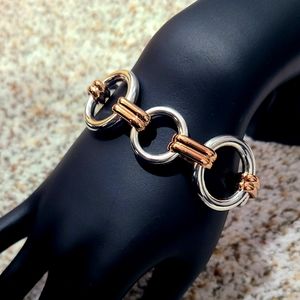 Silver and gold colored bracelet. Great gift for anyone!